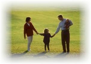 Happy Family Walking Holding Hands